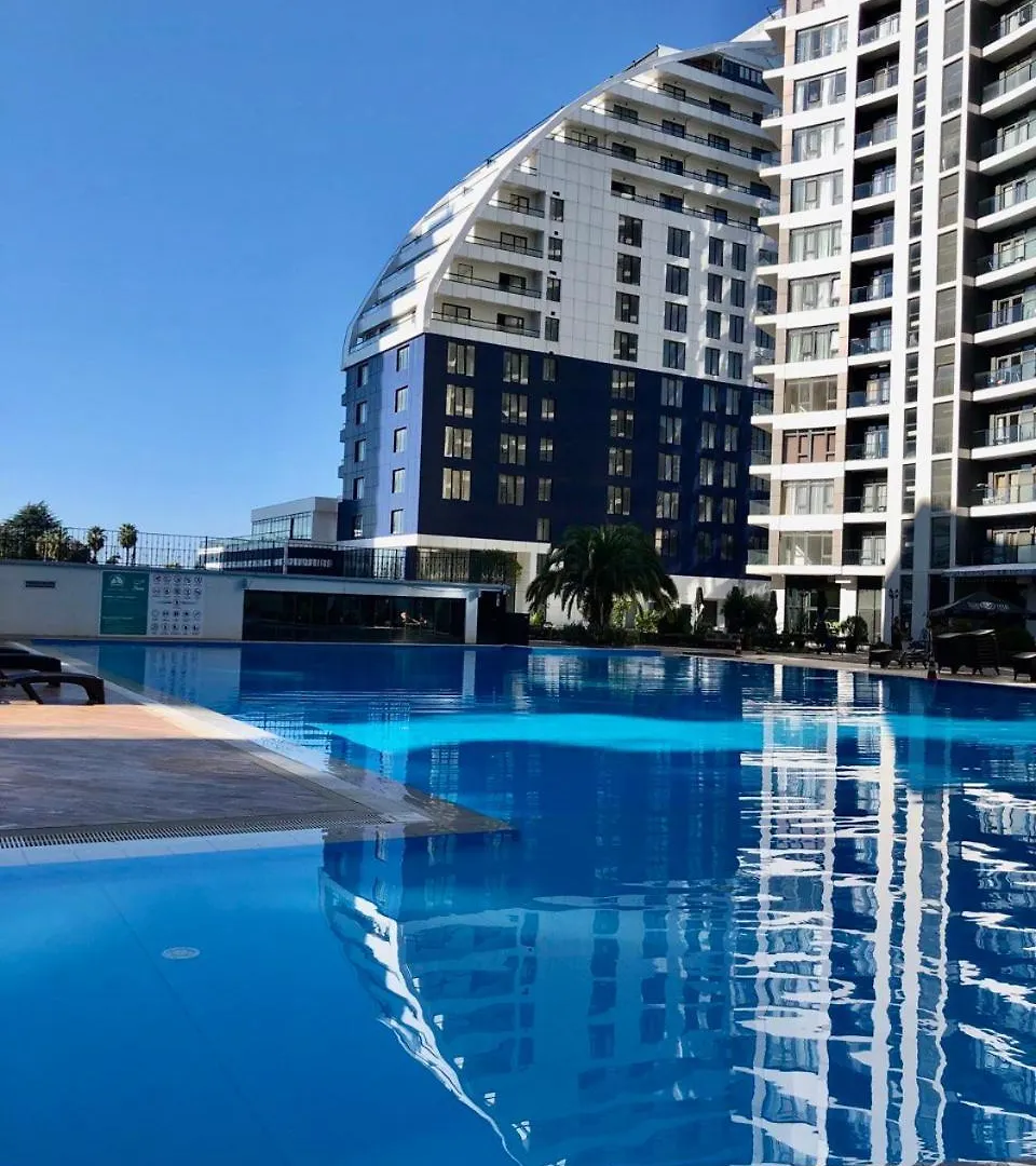 Вид На Закат, Море И Бассейн Batumi Apartment